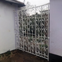 White Wrought Iron Courtyard Gates